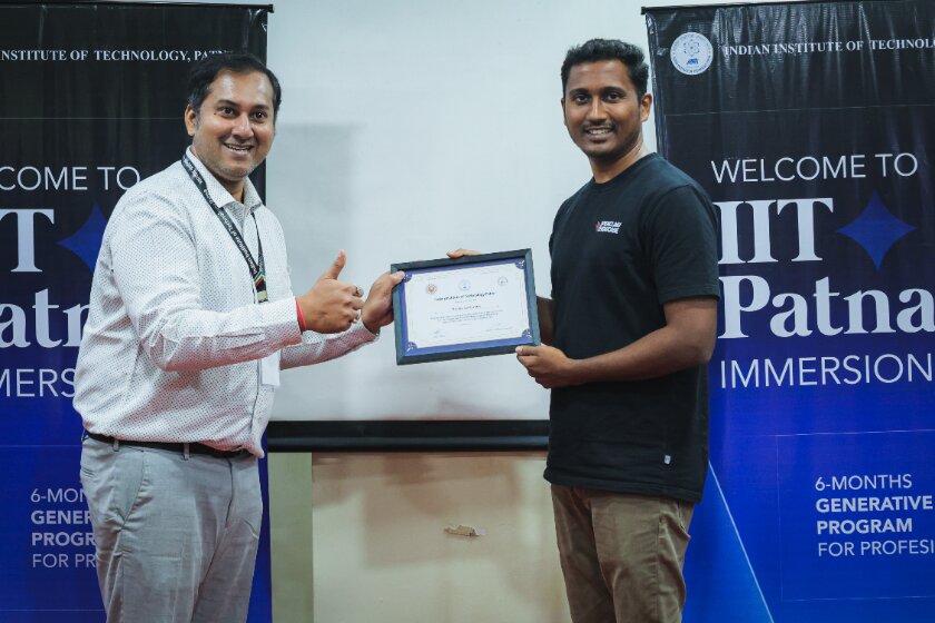 A learner receives a certificate at the IIT Patna campus immersion